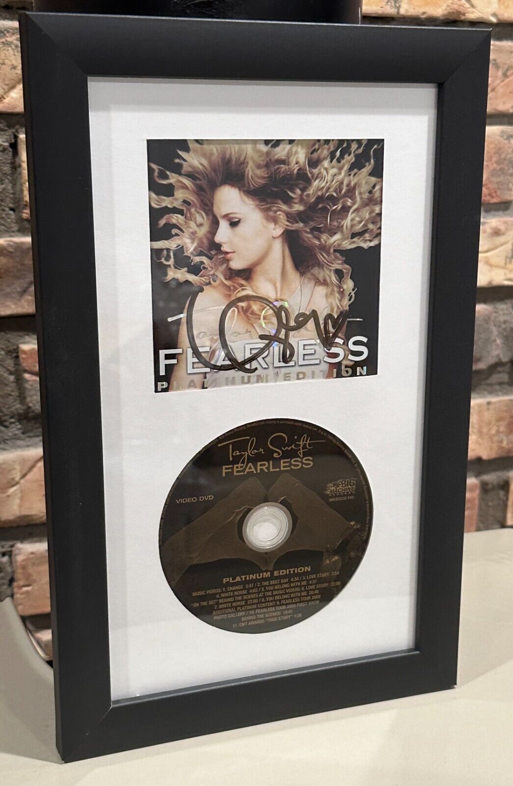Taylor Swift Autographed Fearless Deluxe Platinum Edition CD/DVD FRAMED